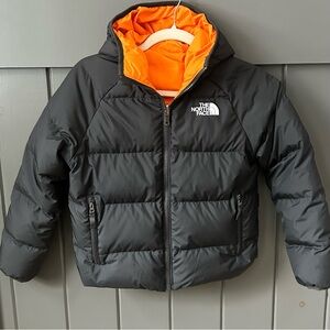 The North Face Reversible Black and Orange Puffer Jacket